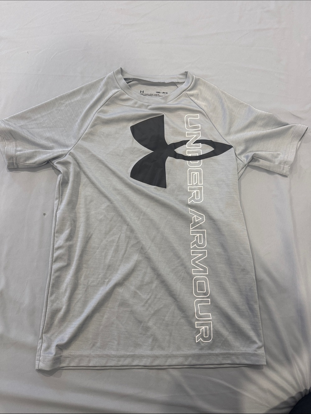 Under Armour Light Gray Performance Tee with Black Logo. Used. Size MY.